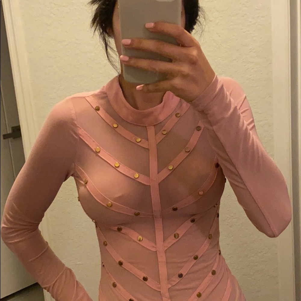 Women’s pink body suit